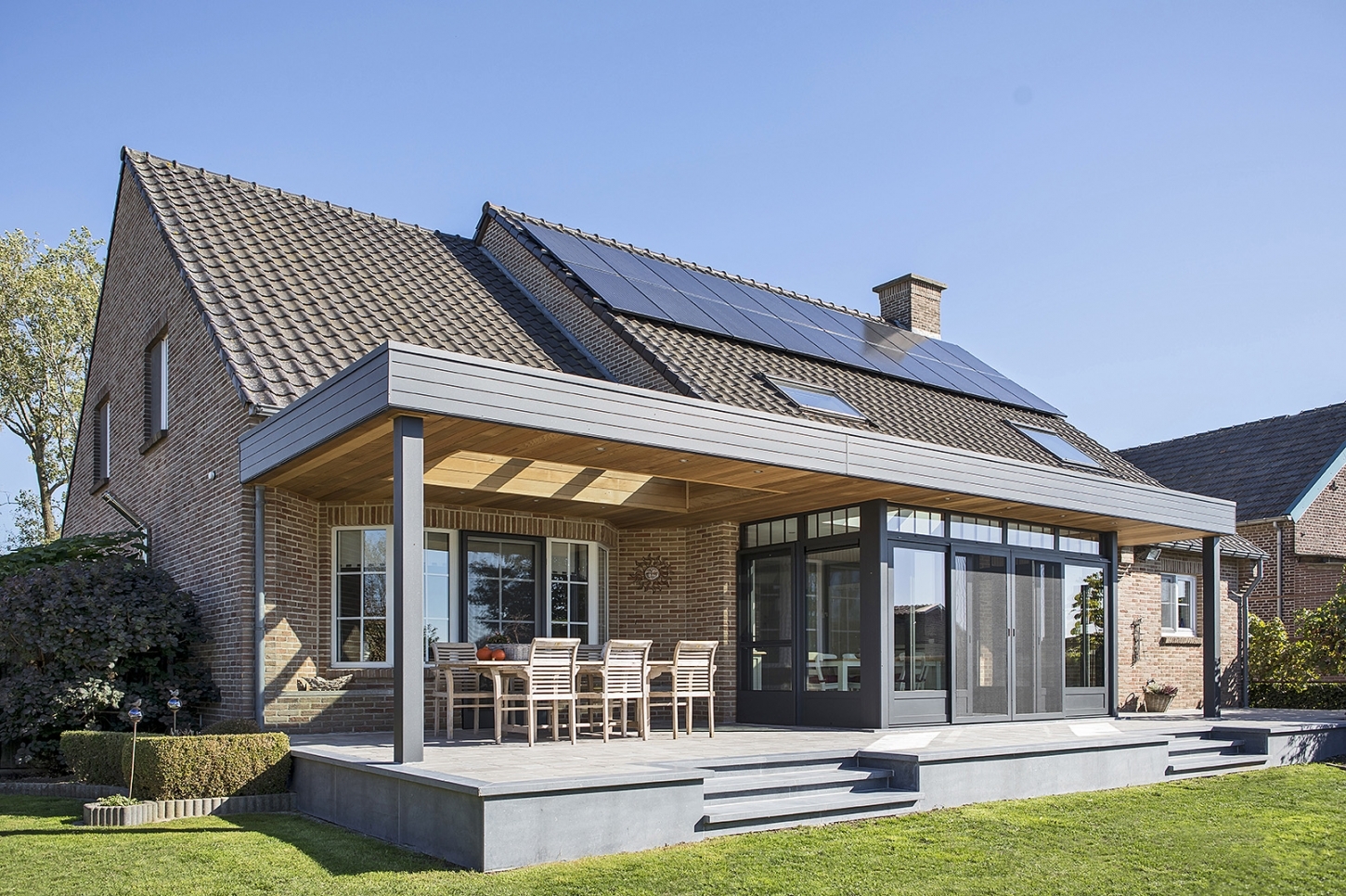 Een landelijke veranda koppelt een klassieke atmosfeer aan een perfecte integratie met je woning. 